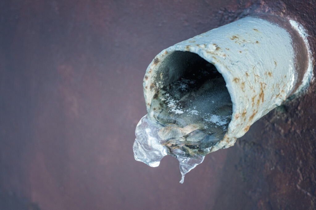 Frozen ice in a drainage pipe