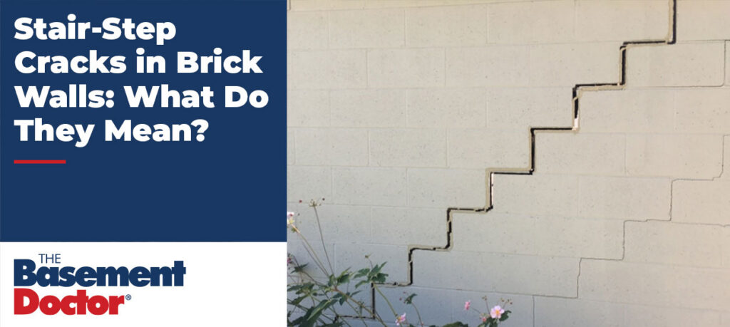 Stair‑step crack running through an exterior brick wall, illustrating a common foundation settlement issue.