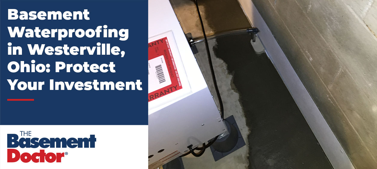 Interior basement waterproofing system installed along a foundation wall in a Westerville, Ohio home, showing a perimeter drainage channel directing water toward a sump pump system.