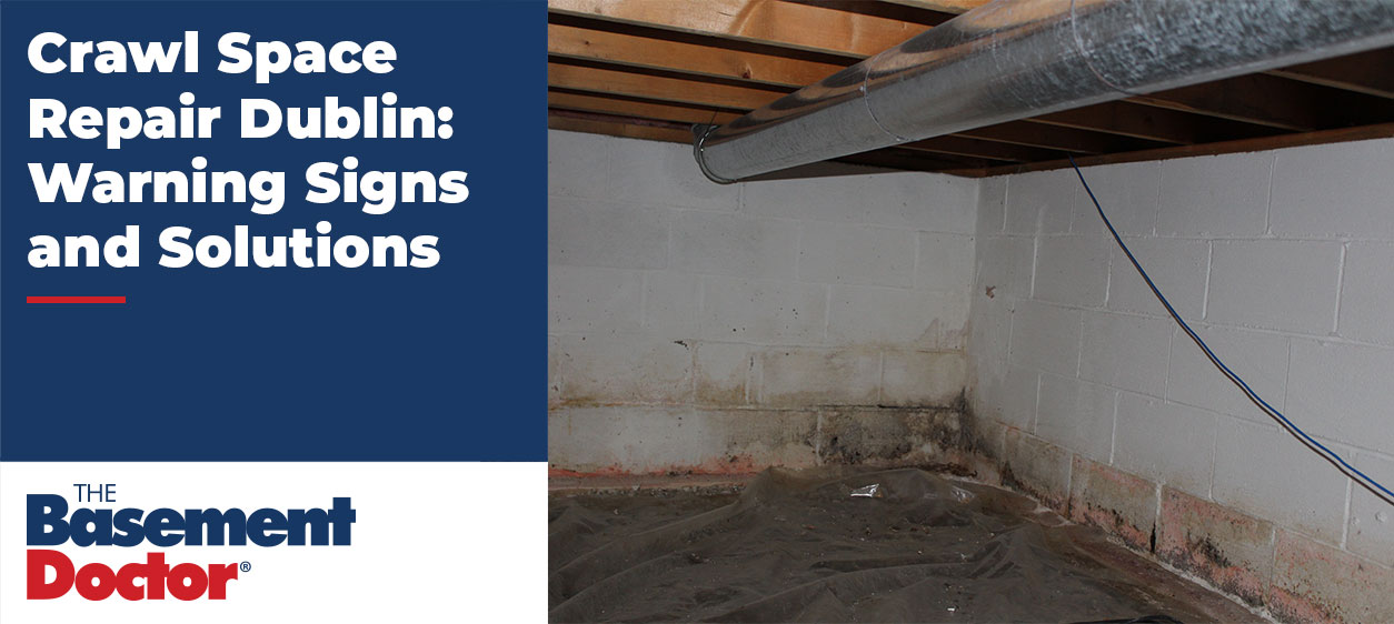 Crawl space in a Dublin, Ohio home showing signs of moisture intrusion, including staining along foundation walls and a deteriorating vapor barrier that may require professional repair.